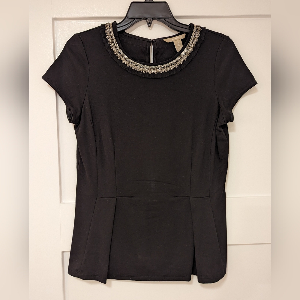 Black peplum beaded top